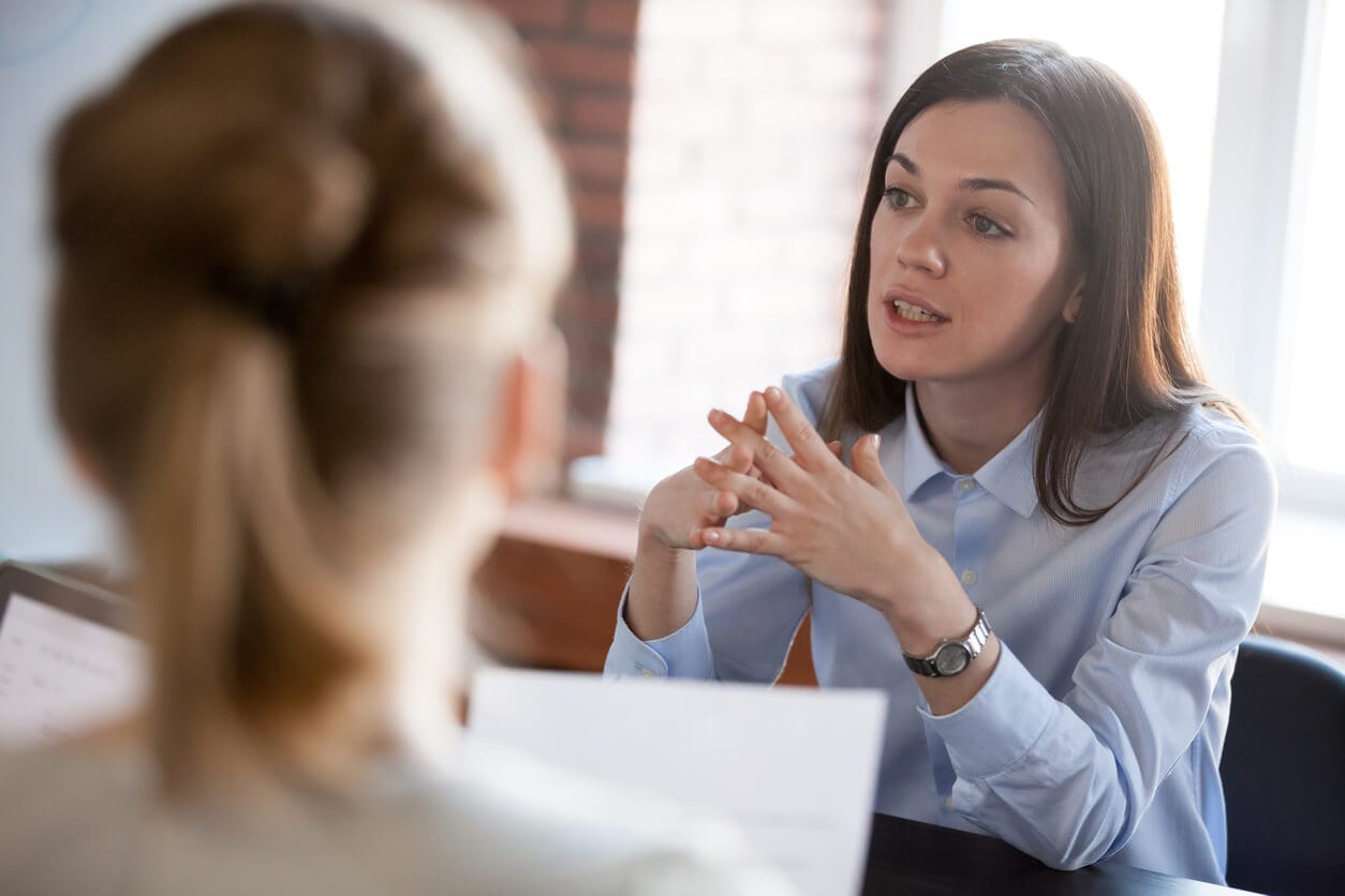 Manager and employee discussing results under a performance standard