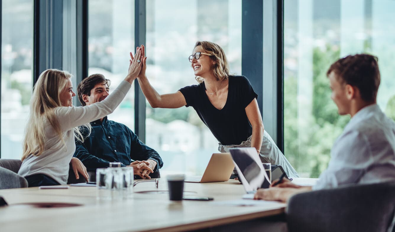 Manager sharing positive feedback to boost employee morale